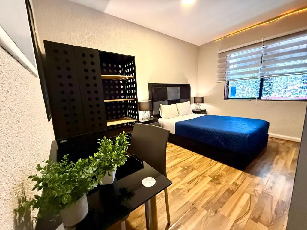 Habitación del hostal Roomies Express en la calle Atlixco, Condesa, CDMX